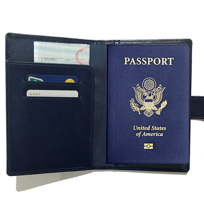 Black passport wallet open view with inner card slots shown