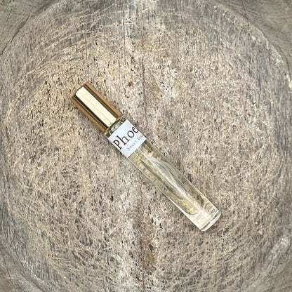 Phoebe Sweet Anthem roller perfume bottle with gold cap, clear glass