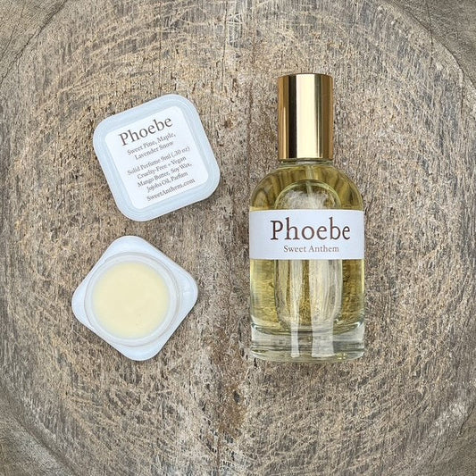 Phoebe Sweet Anthem perfume bottle with balm jar, white lid, and label card