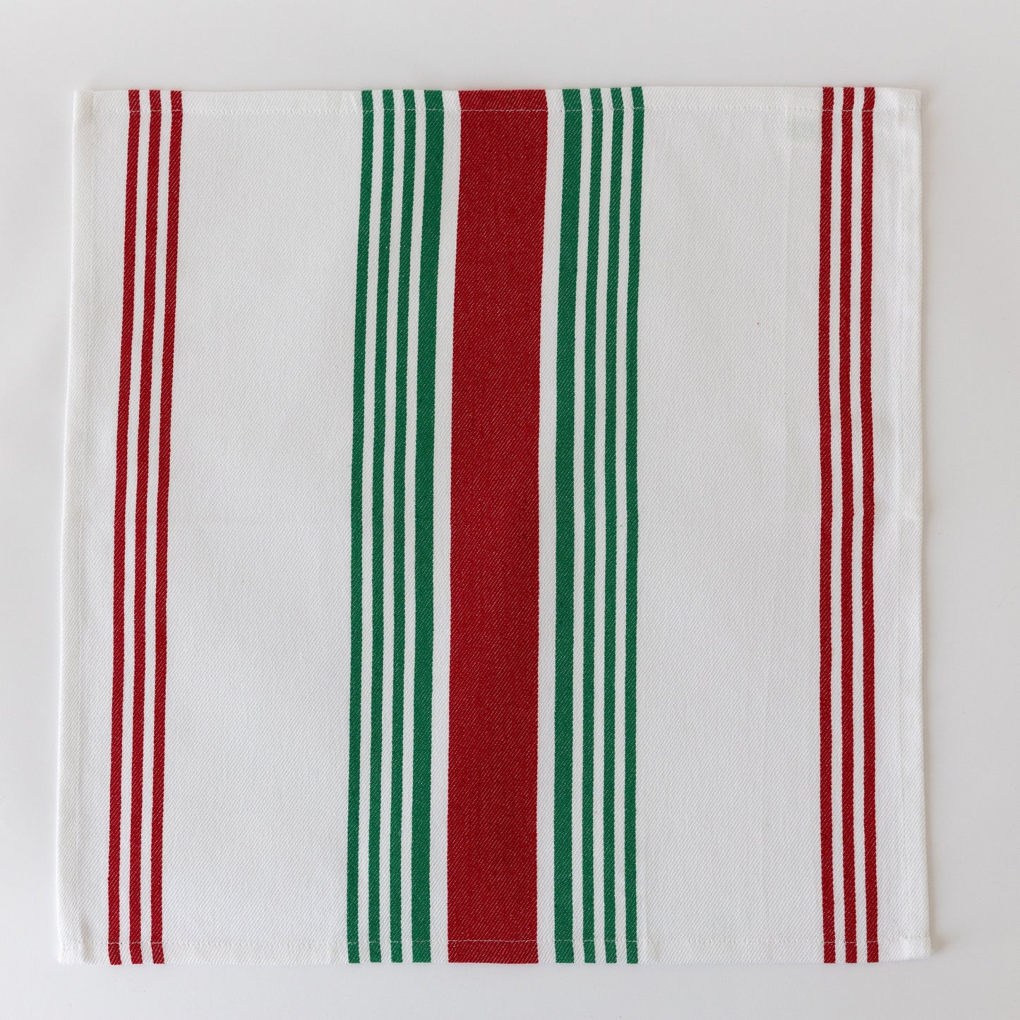 Striped cloth napkin with vertical stripes in red, green, and white