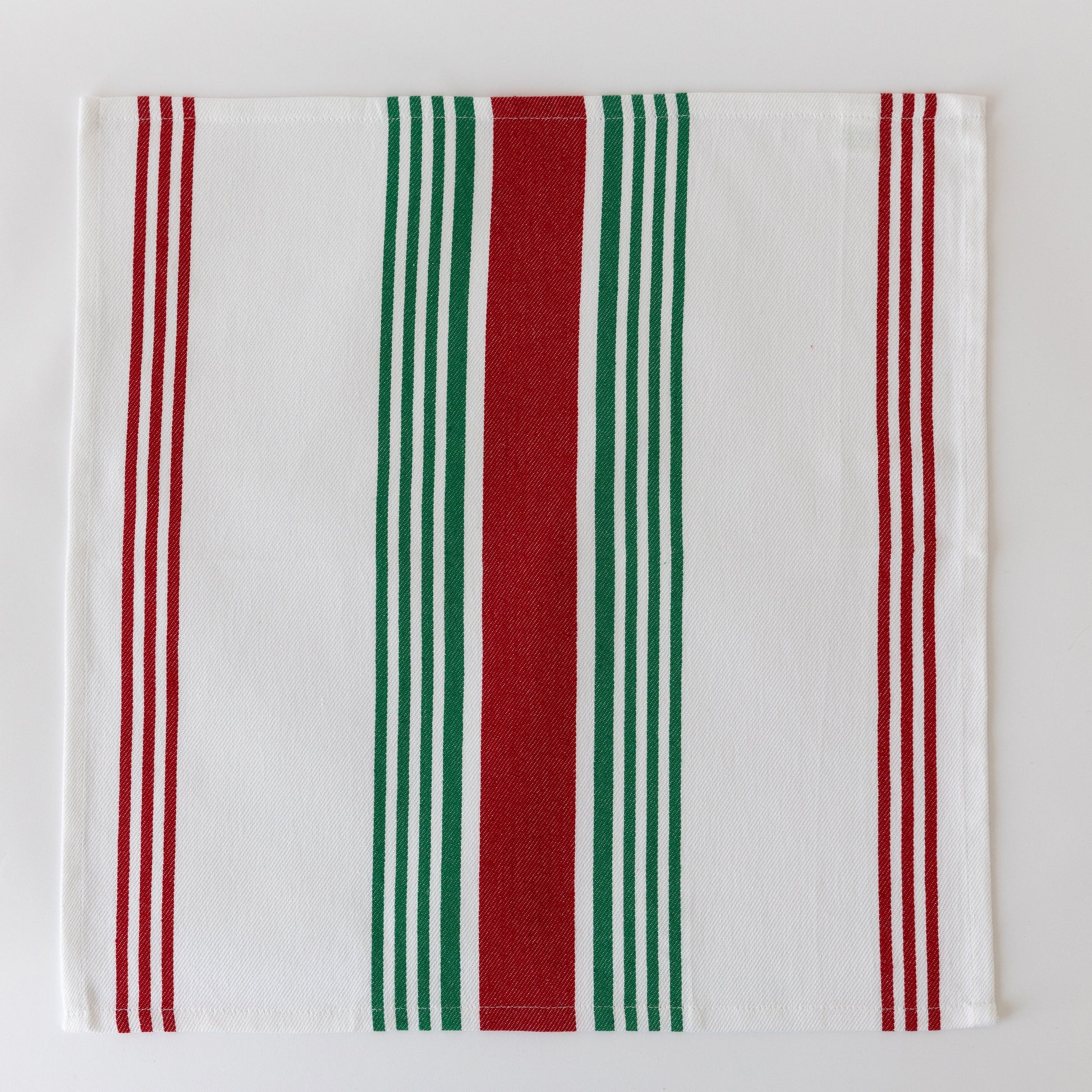 Striped cloth napkin with vertical stripes in red, green, and white