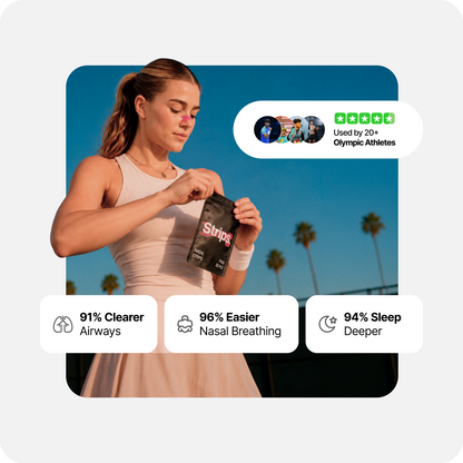 Woman holding a black nasal strips pouch while jogging outdoors