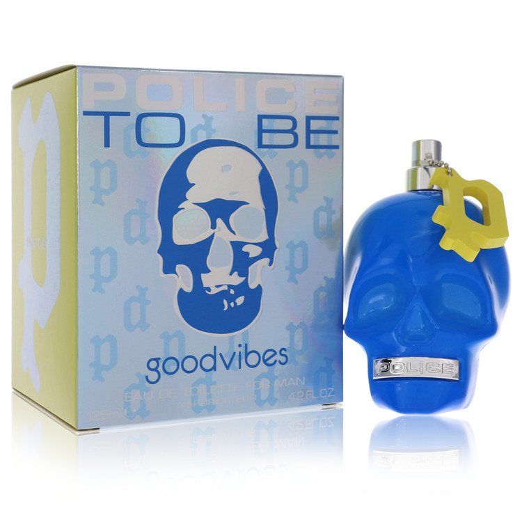 Blue eau de toilette spray bottle with star cap and matching Good Vibes box