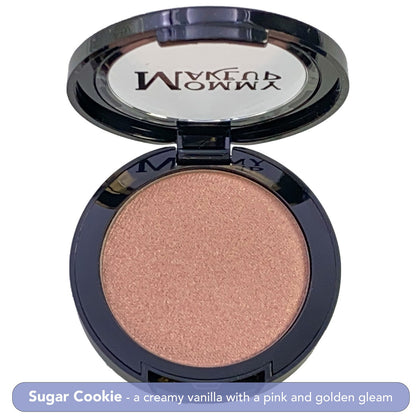 Shimmer makeup compact in pale rose nude with gold sheen, open black case