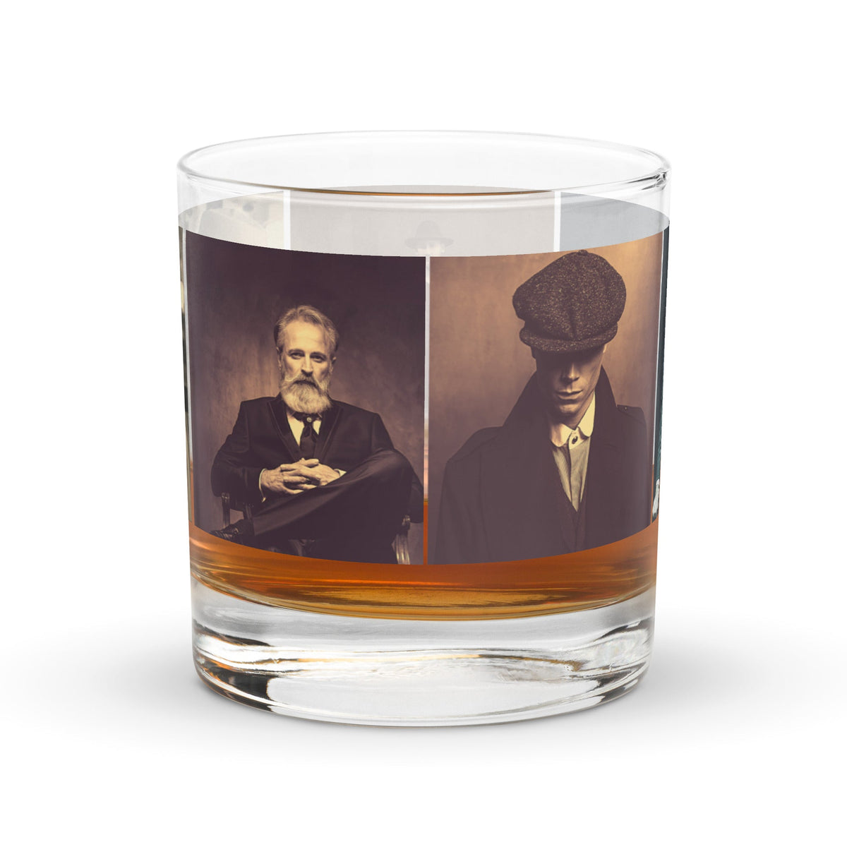 Clear glass tumbler with two sepia portrait photos on the wrap and orange band near base