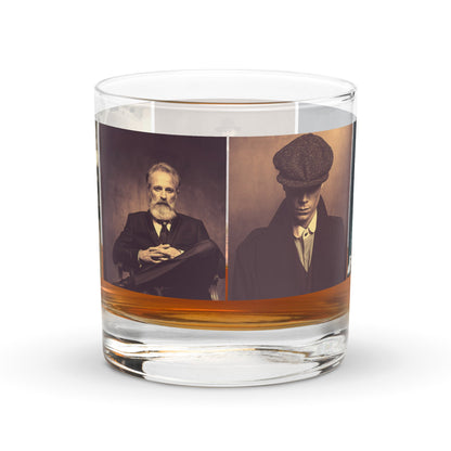Clear glass tumbler with two sepia portrait photos on the wrap and orange band near base