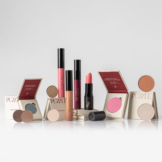 Beauty cosmetics set with lipsticks, lip glosses, and powder compacts in boxes
