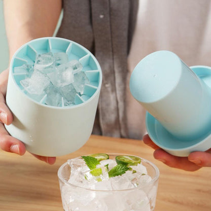 Light blue silicone cylinder ice maker bucket with tray of ice cubes
