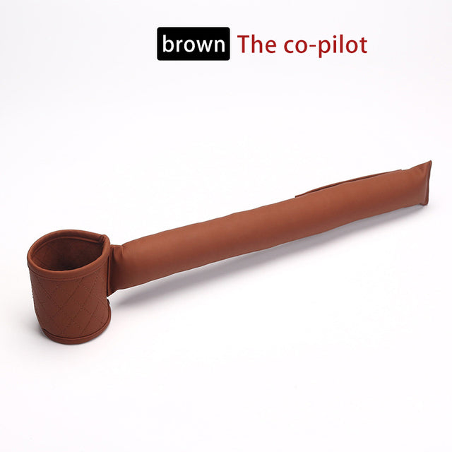 Brown car seat gap filler with quilted cup holder end and long strap