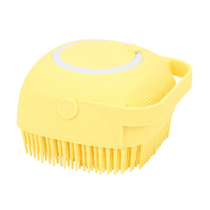 Yellow dog bath brush with soft bristles and circular top opening