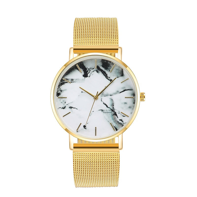 Women’s gold mesh band quartz watch with white marble dial and gold-tone hands