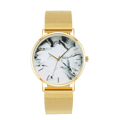Women’s gold mesh band quartz watch with white marble dial and gold-tone hands