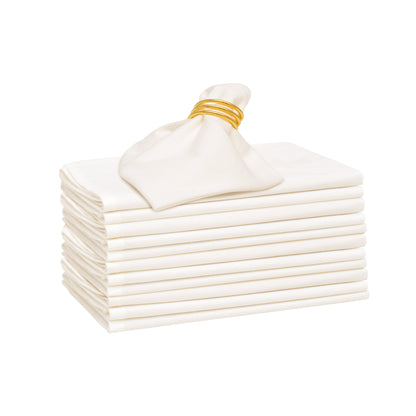Flour sack napkins, white, folded stack secured with gold ribbon