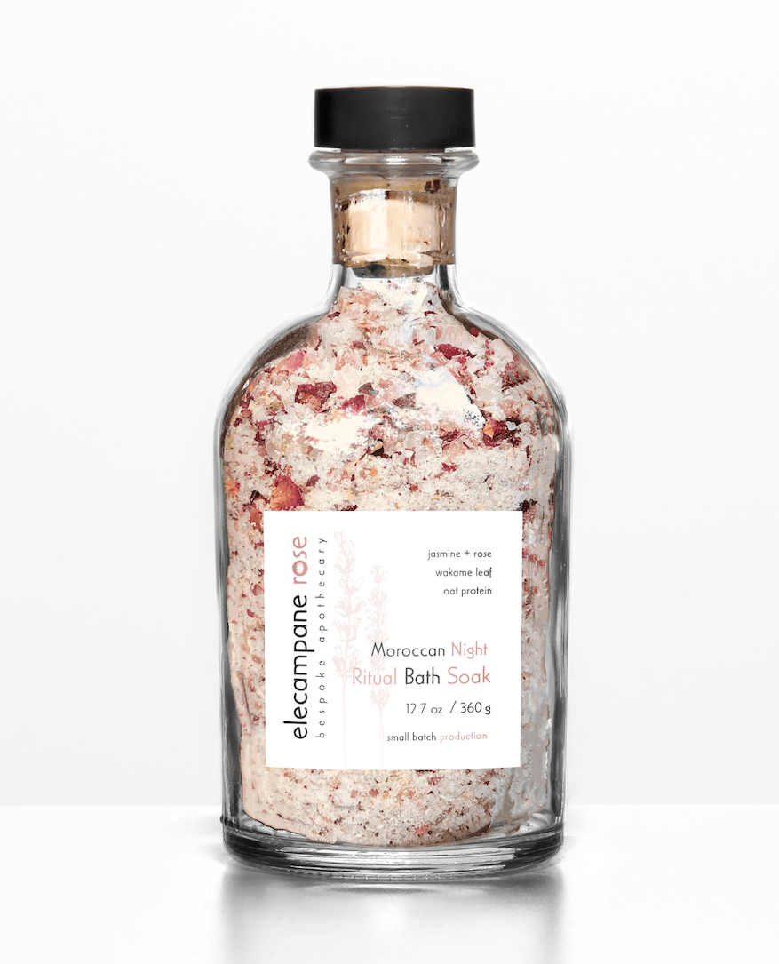 Ritual bath soak in clear glass bottle with black cap, Moroccan Night label