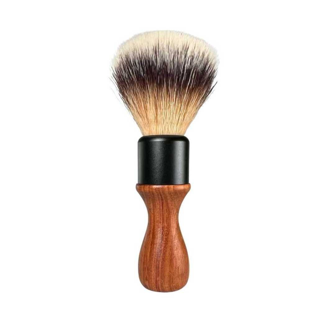 Shaving brush with wood handle, black collar, and dense soft bristles