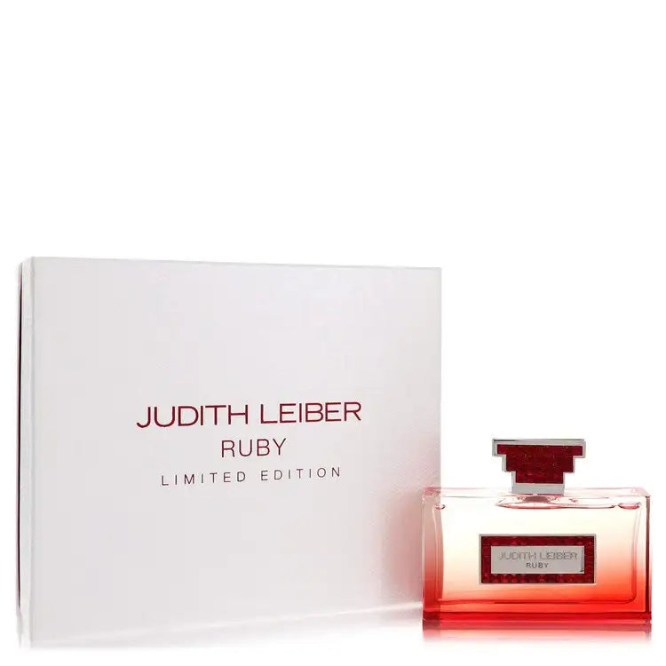 Judith Leiber Ruby perfume bottle with red liquid, topped cap, beside white limited box