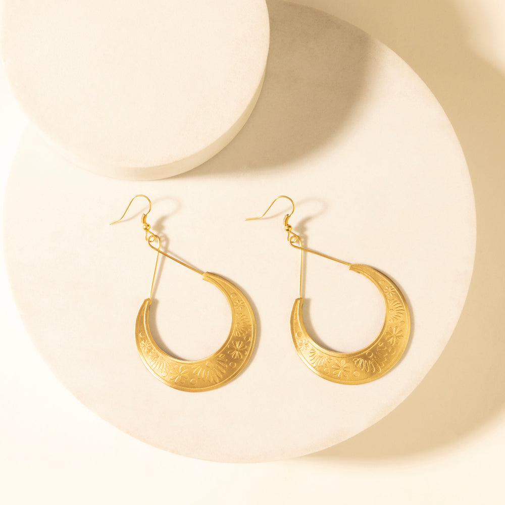 Gold-tone crescent drop earrings with engraved pattern and fishhook backs