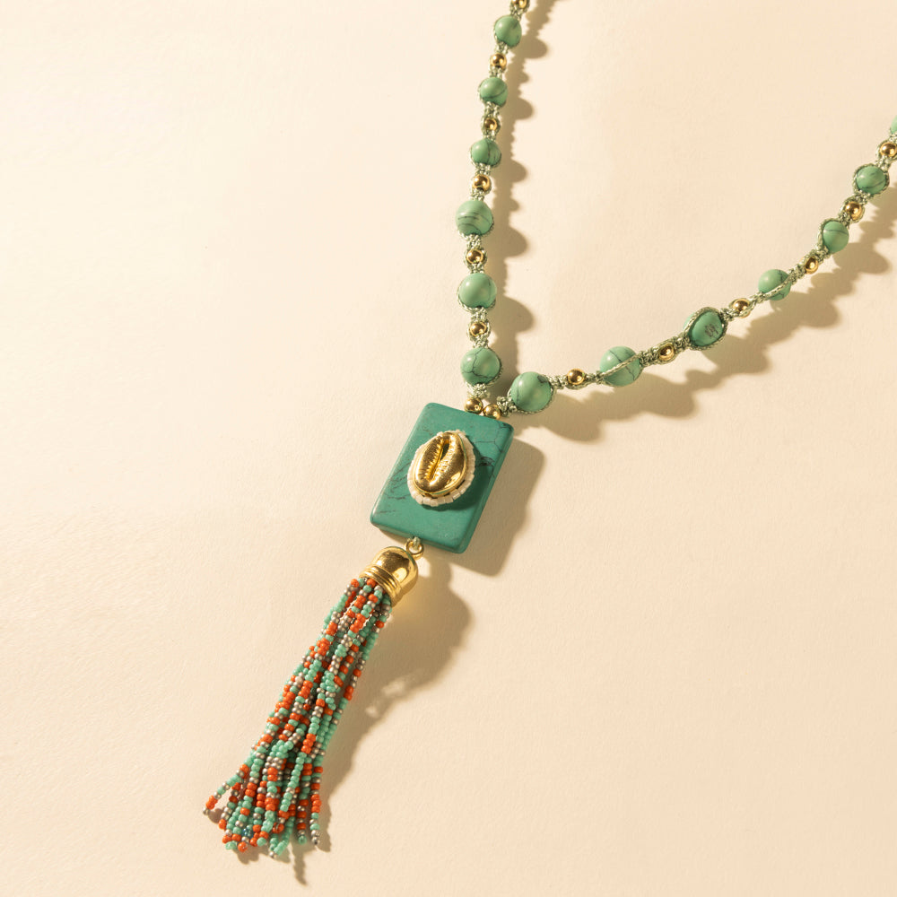 Myra Sun beaded necklace with turquoise beads and square teal pendant with tassels