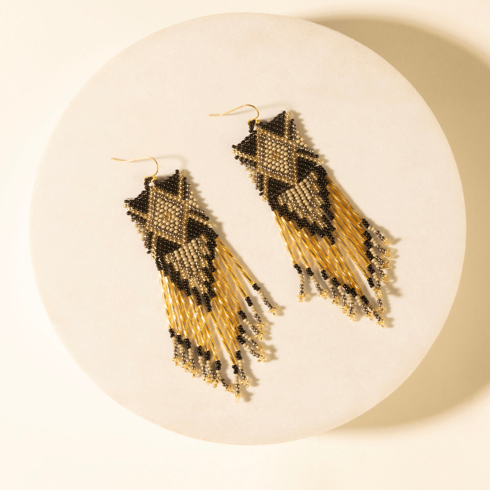 Beaded fringe earrings in champagne with black sunburst tops and gold drops