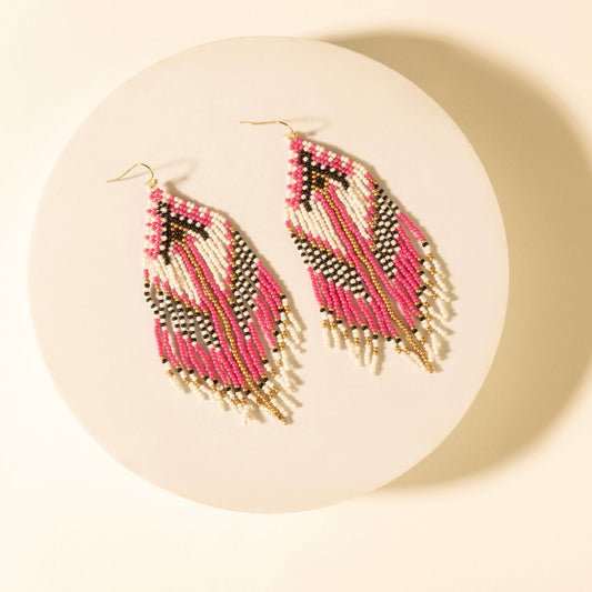 Dusty rose, white, and black chevron beaded drop earrings with gold fringe