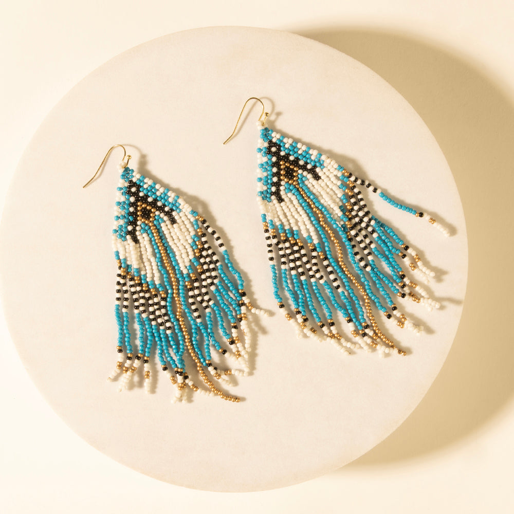 Chevron bead drop earrings with turquoise, dark and gold fringe on gold hooks
