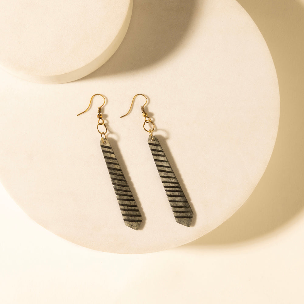 Striped drop earrings with gold-tone hooks; dark gray bar dangles