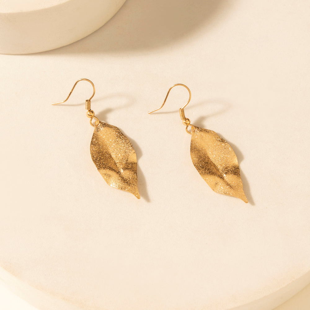 Pair of leaf dangle earrings, weathered amber finish with gold-tone fishhook backs