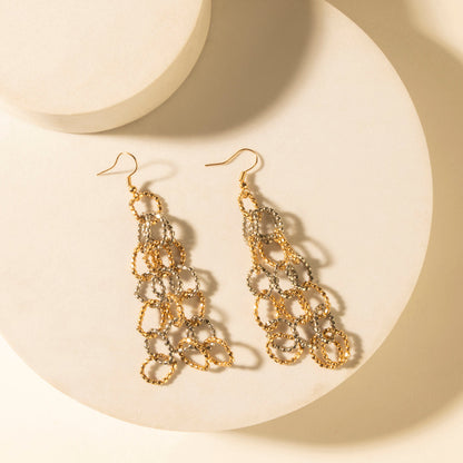 Dangling loop earrings, burnished amber, layered chain links with gold-tone hooks