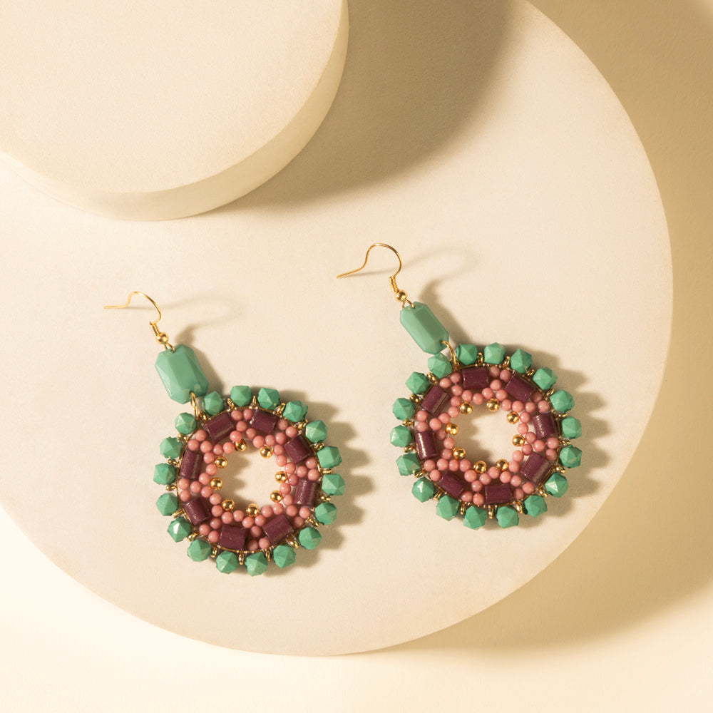 Turquoise plum beaded medallion earrings with pink and green round bead accents