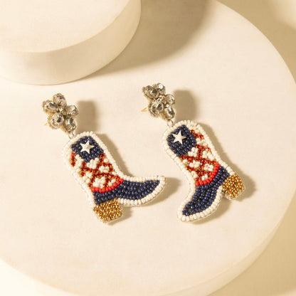 Boot-shaped beaded earrings, dark blue toe, red diamond band, star face, gold bead tops.
