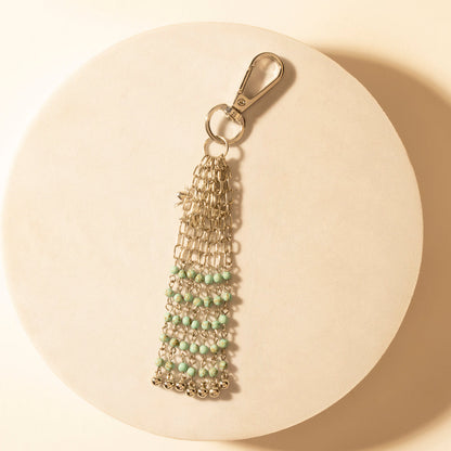 Beaded keychain with turquoise and green beaded tassel and gold-tone clasp ring