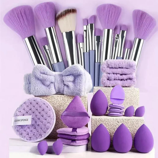 Purple makeup brush set with pouch; circular sponge and teardrop sponge pieces