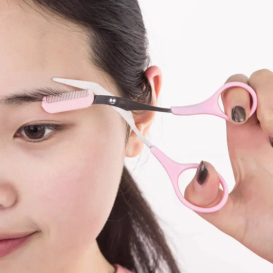 Pink eyebrow trimmer scissors with comb edge and stainless-steel blades