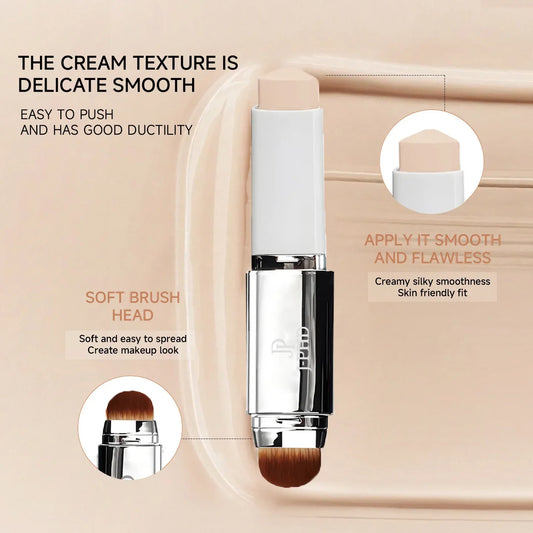 Two-in-one foundation stick with built-in soft brush head, silver cap, beige cream texture