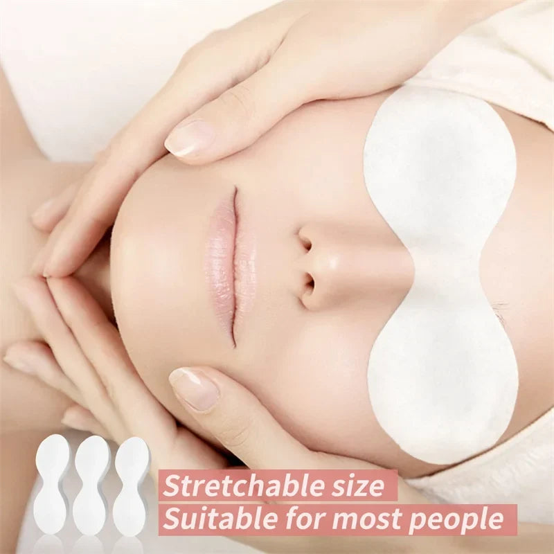 Disposable eye pads placed under the eyes on a face for skincare