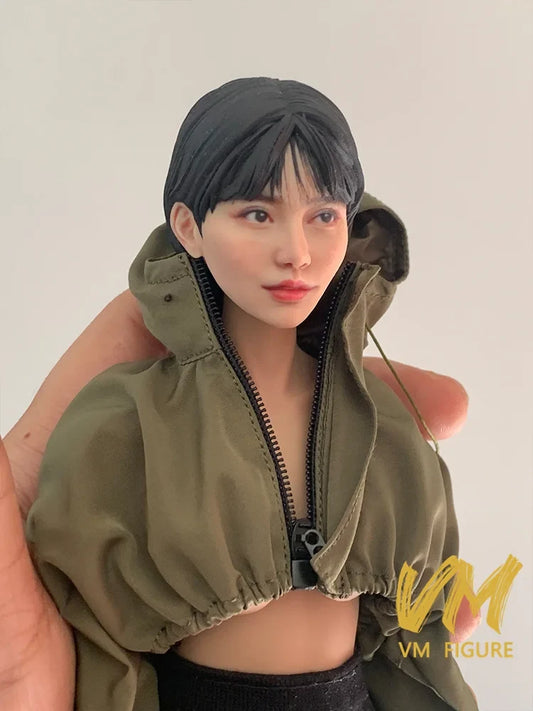 Painted resin female action figure head and upper body, short black hair, olive hooded jacket