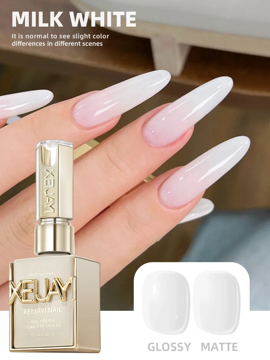 Milky white glossy gel nail polish on long almond nails and bottle