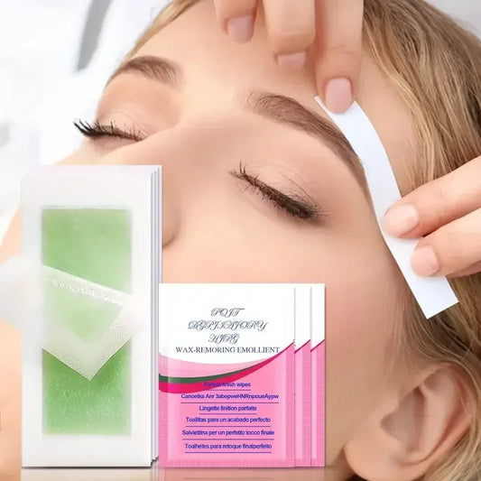 Cold wax hair removal strip for face with green wax sheet held near skin