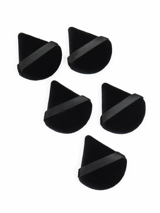 Black triangle powder puff makeup sponges with gray bands, arranged as separate pieces