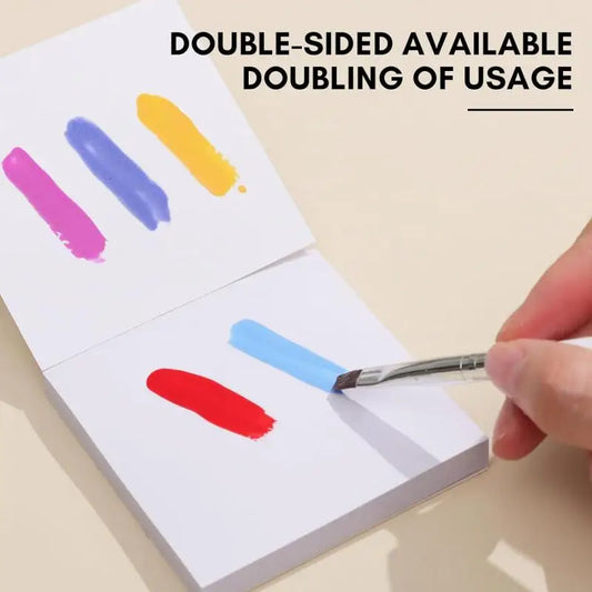 Disposable nail art palette paper sheet with colorful gel swatches and paint brush