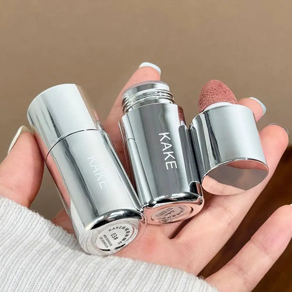 Set of liquid blush sticks with round sponge tips in shiny silver cases