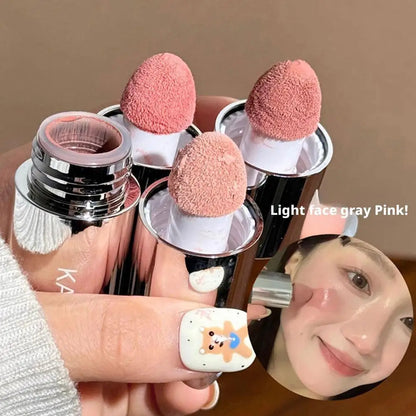 Four liquid blusher sticks with rose-pink sponge applicators and chrome caps