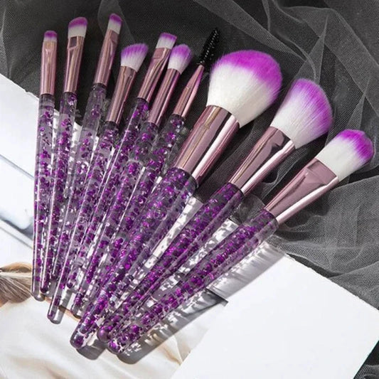 Makeup brush set with purple glitter handles and soft white bristles, neatly arranged