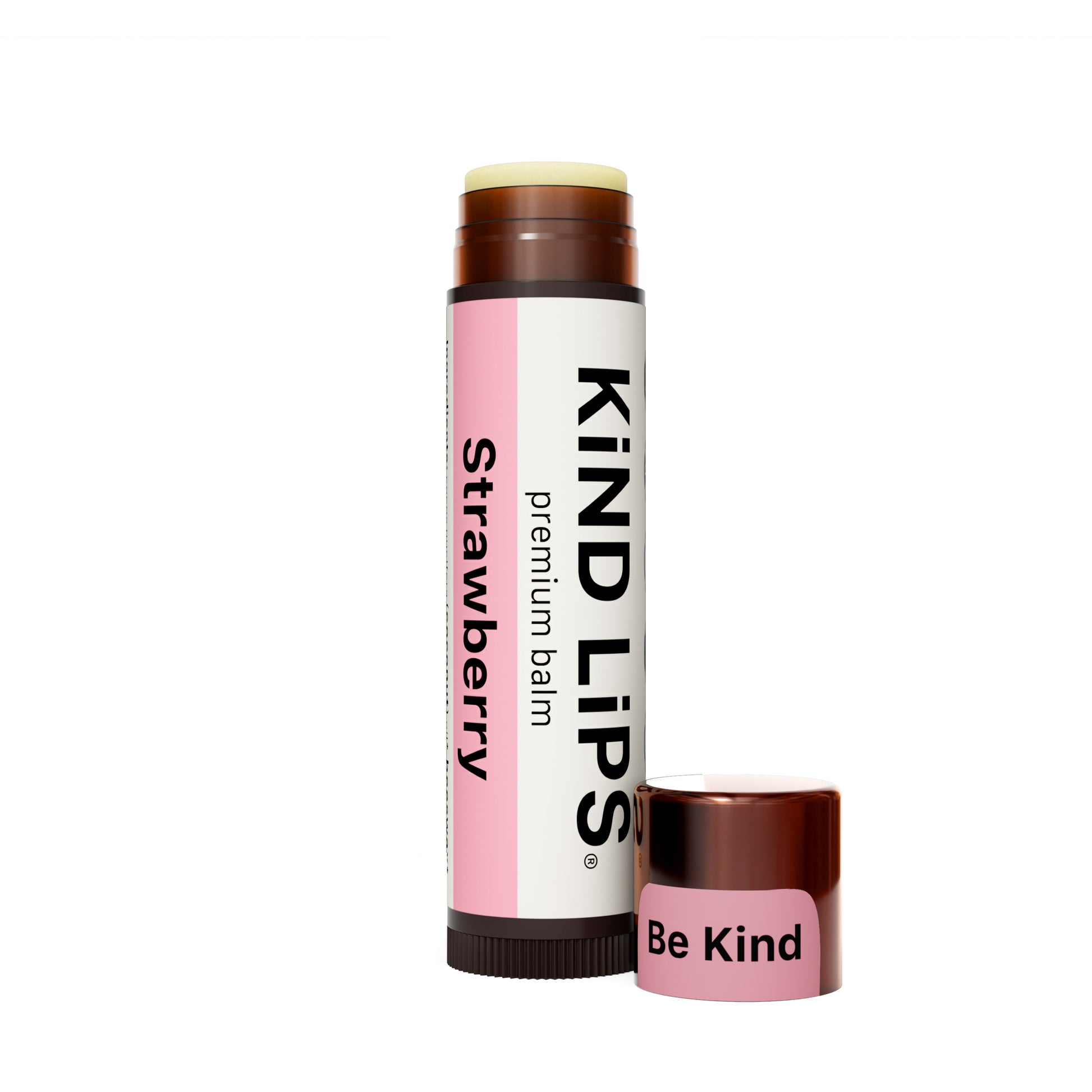 Strawberry lip balm stick in a white-and-pink tube with brown cap and mini Be Kind pot
