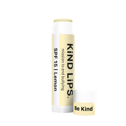 SPF 15 lemon lip balm tube and stick with Be Kind label