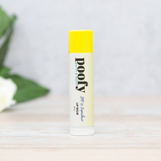 Lip balm with yellow cap in white tube, SPF 15