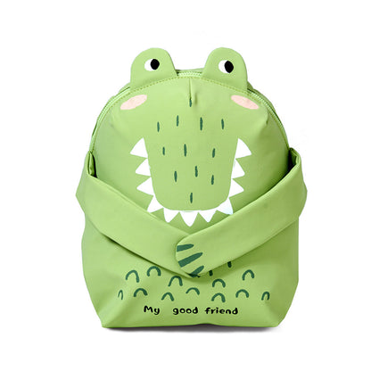 Children's green crocodile backpack with front face and curved top handle