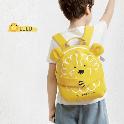 Children's yellow lion backpack worn by child with front face applique and shoulder straps
