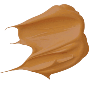 Liquid foundation swatch, warm amber tan with smooth satin finish
