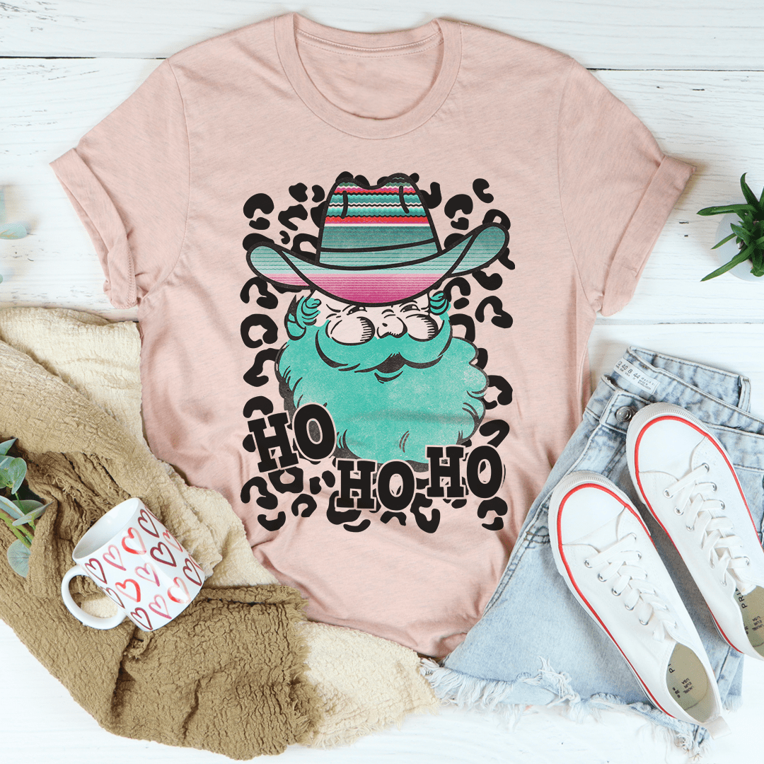 Santa cowboy graphic T-shirt in mauve pink with leopard-style frame and beard